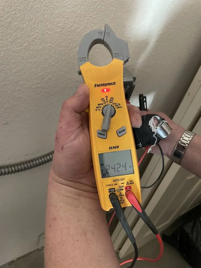 Voltage testing with clamp meter during Generator Installation in Bulverde